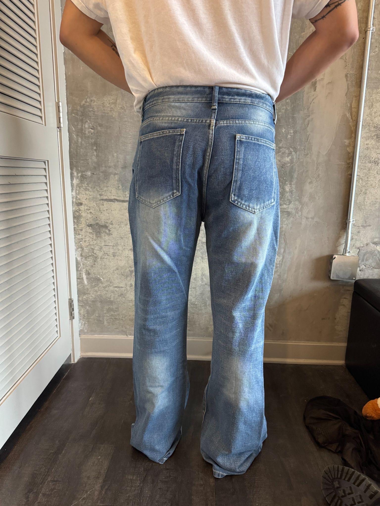 Original jeans worn, side view.